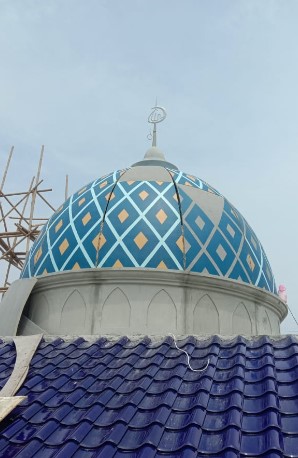 Harmonisasi Rekayasa Komposit Beton 2026: Sinergi Rancang Bangun Kubah Serat Kaca dan Komparasi Ketahanan Baja Nirkarat